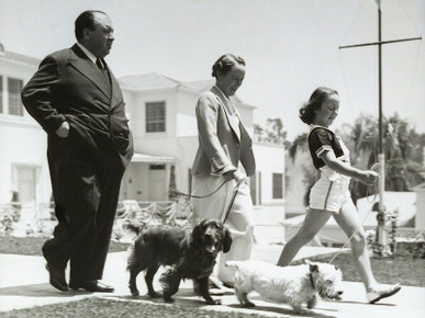 Director Alfred Hitchcock, Wife Alma and Daughter Patricia Take a Morning Stroll with Their Dogs